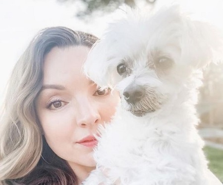 David Miller and Sarah Joy Miller's pet dog, Cosmo, passed away on January 31, 2021.