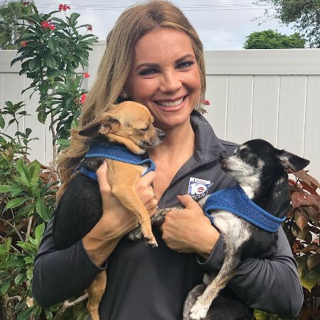 Jacey with two little puppies. 