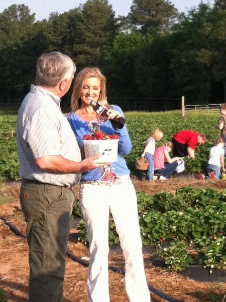 Stacey Elgin interviewing with some farmers. 
