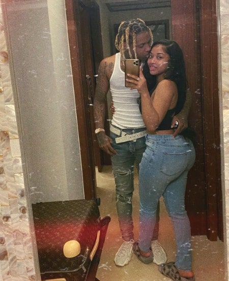 Lil Durk and his girlfriend India Royale taking a mirror selfie.