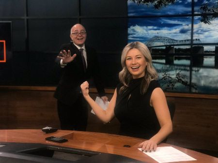 Carissa enjoying social distancing with her co-reporter at FOX 7 News Set.