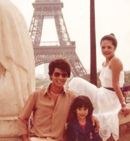 The childhood image of journalist Cher Calvin with her father Roger Calvin and Georgia Holt.
