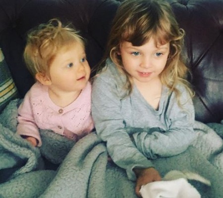 Bee Tucker and her husband's daughters Violet (right), Rose (left).