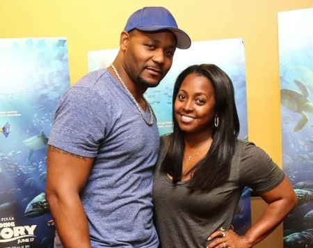 Edgerton Hartwell wearing blue t-shirt and a blue cap. 