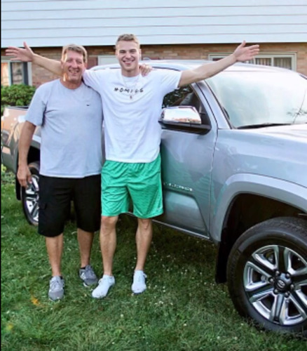Matthew Noszka and his father Daniel Noszka posing for a picture