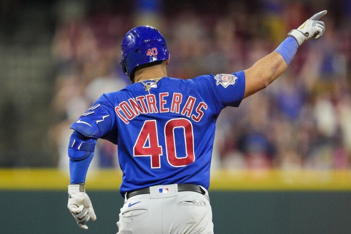 Willson Contreras in baseball jersey.