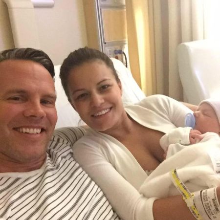 Bruce Hasselberg's son James Hasselberg with his wife and son.