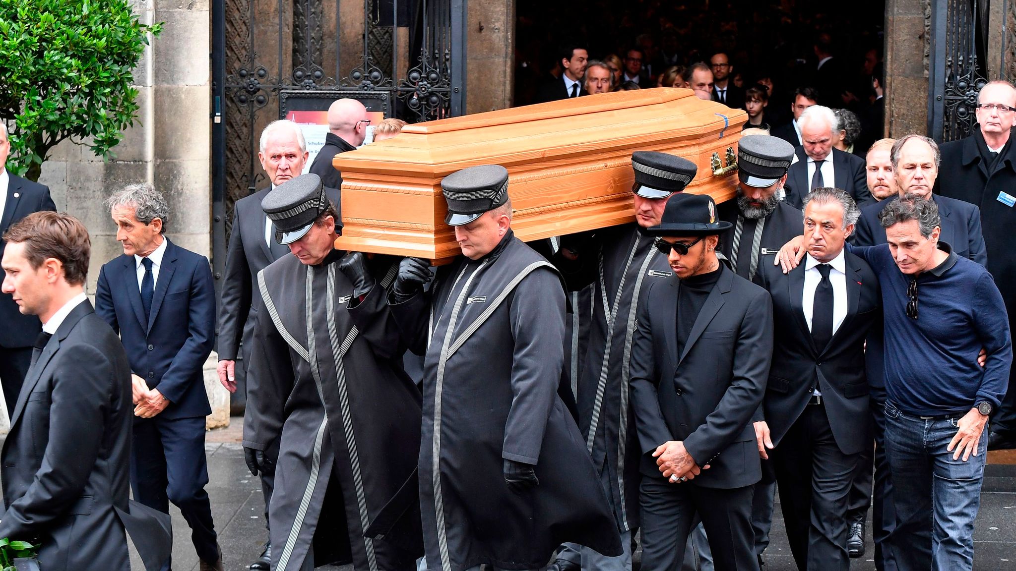 Niki Lauda's body is being carried out for the funeral.