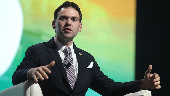 Tanya Tay's husband, Jack Posobiec, giving a speech