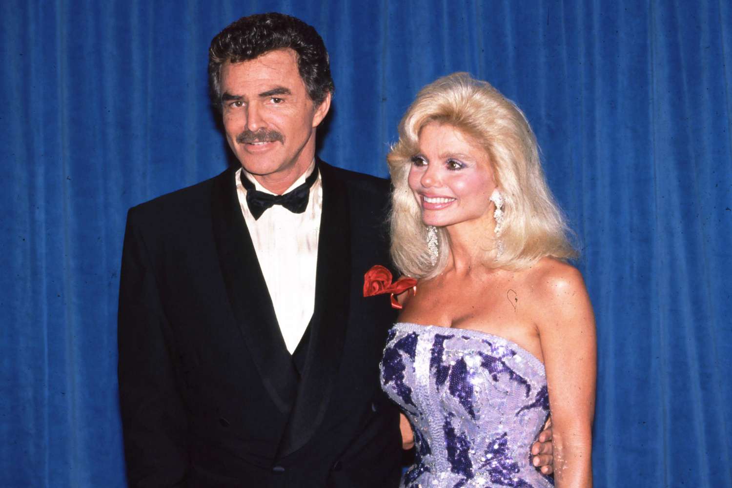 Loni Anderson & her ex-husband Burt Reynold in an event.