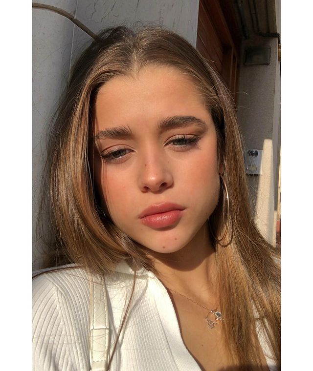 Photo of Berta Castane  wearing a white top.