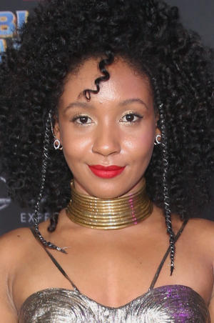 Nabiyah Be in her curly hair 