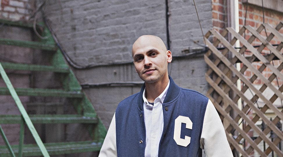 Jody Lee Lipes wearing white shirt and dark blue coat