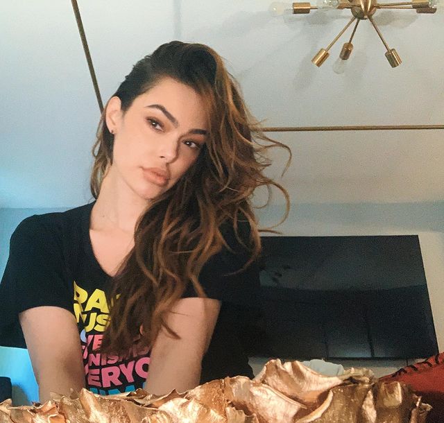 Photo of Anabelle Acosta wearing a black t-shirt