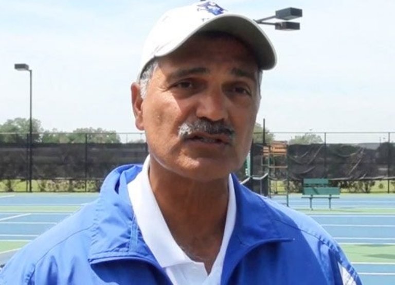 Burzis Kanga was captured wearing a white cap, and blue wind Chester.