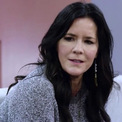 Yolanda Walmsley with a black hair in a frame.