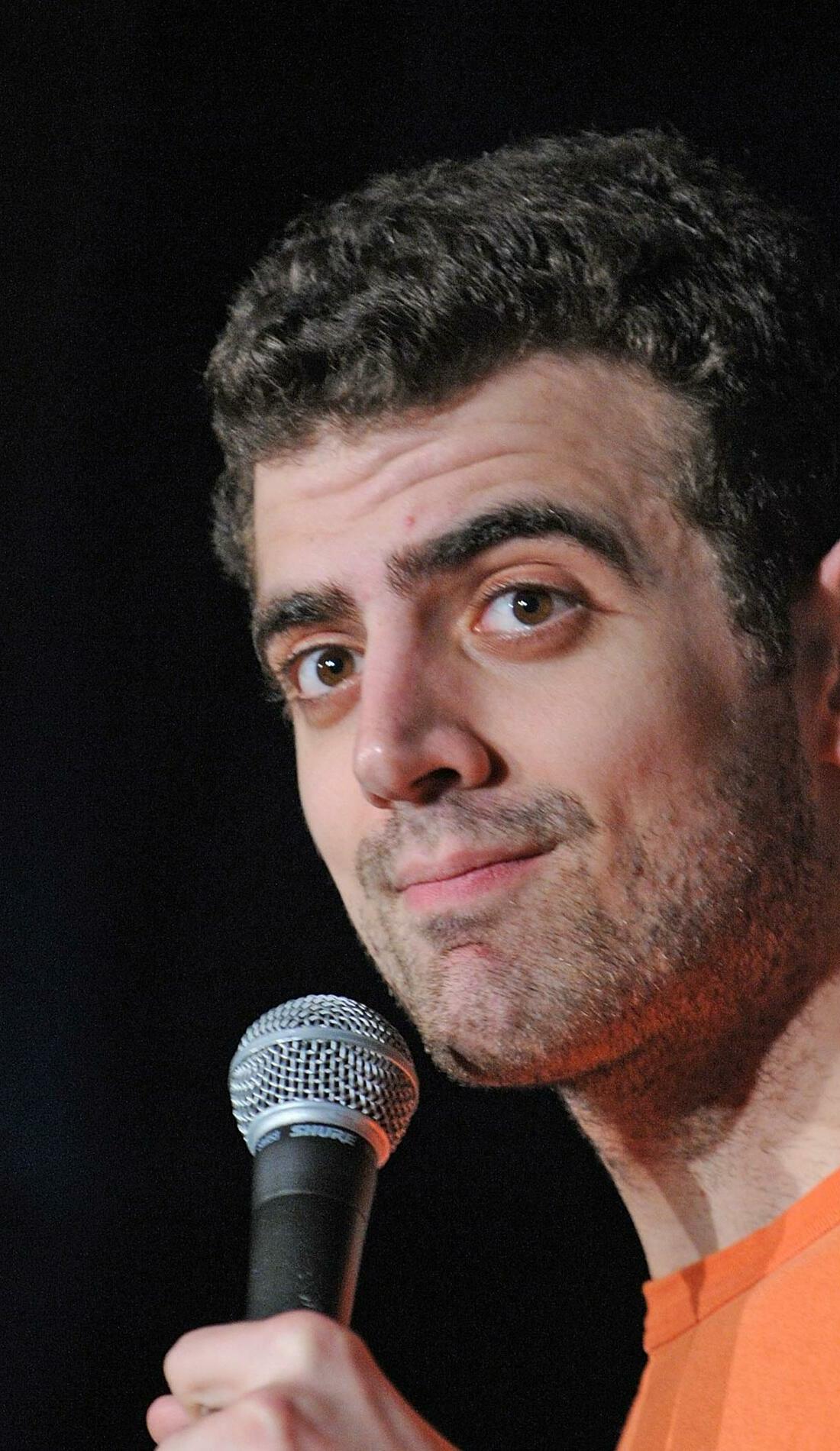 Sam Morril on his mike.