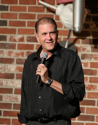 Allan Havey posing by wearing black shirt.