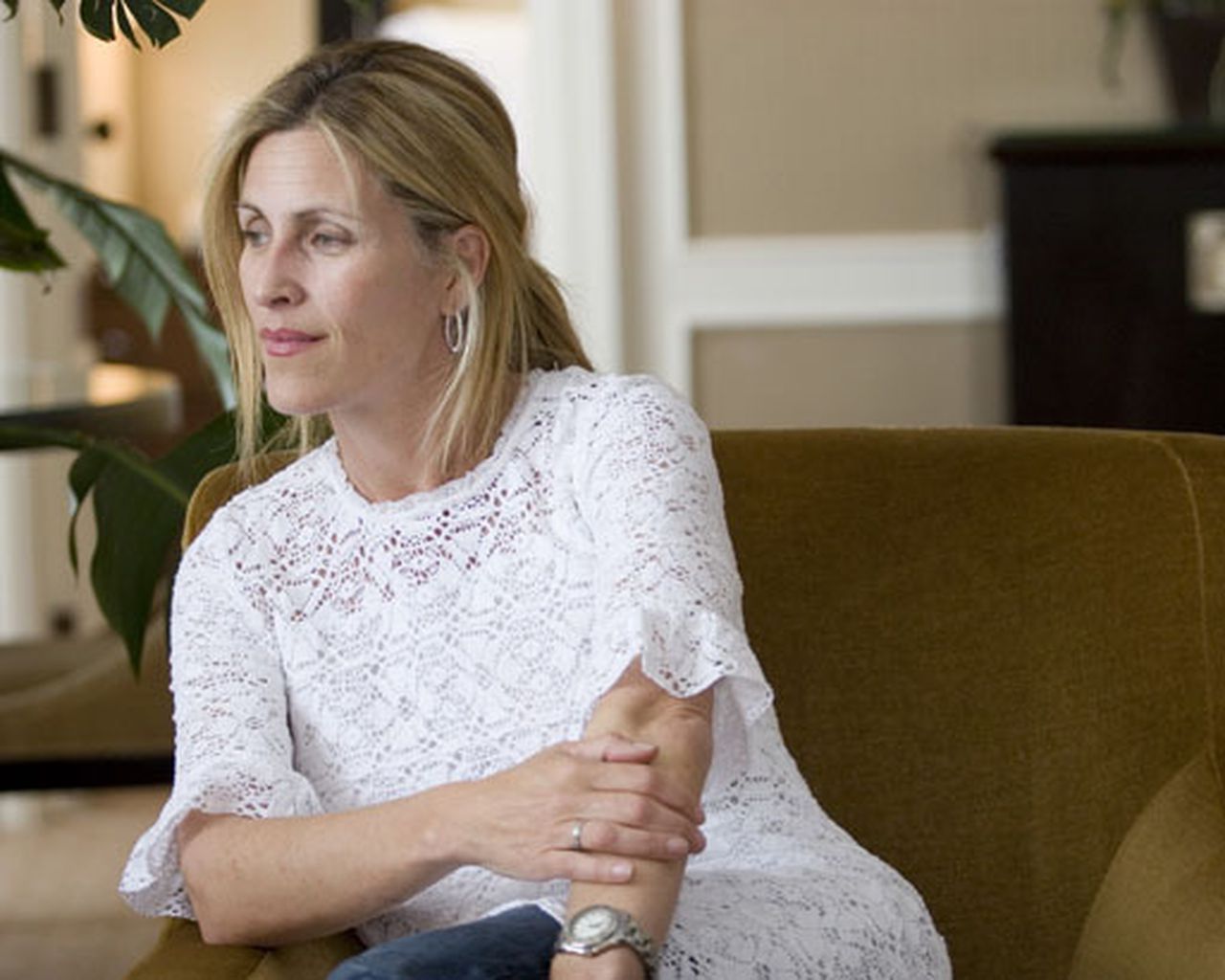 Mary Jo Eustace wearing white long tshirt