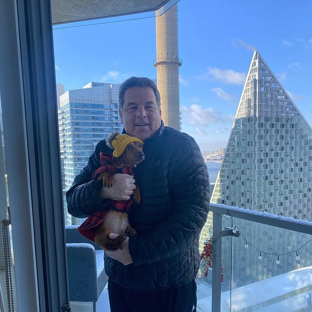Steve Schirripa carrying his Dog Willie