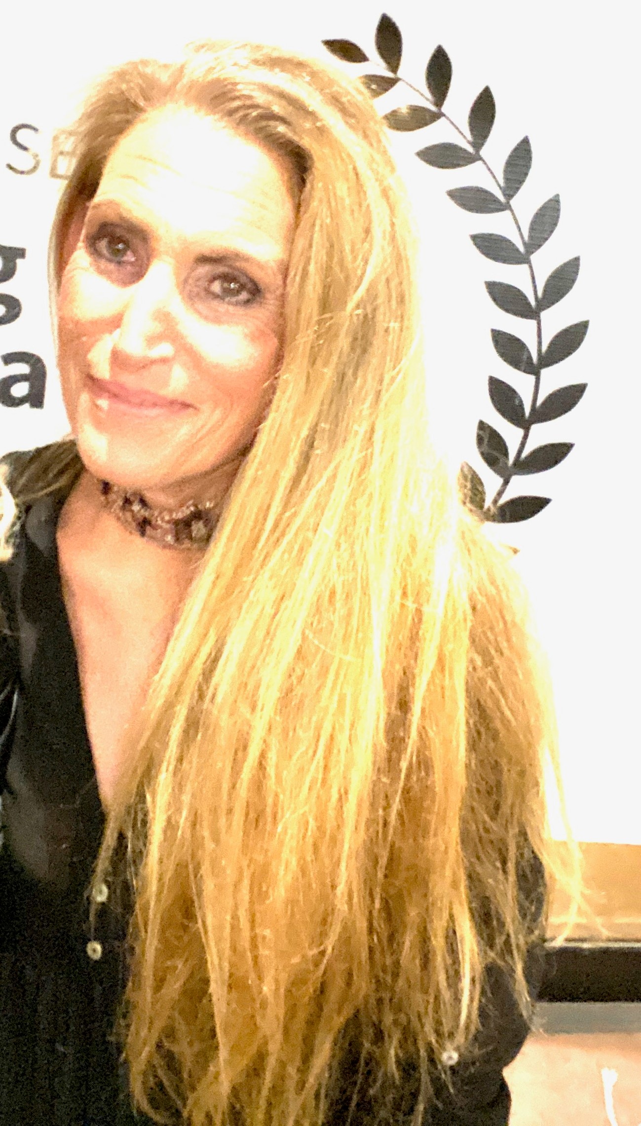 Liza Asner in a golden long hair