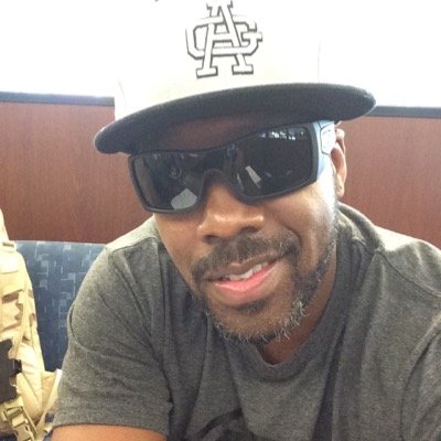 Kadeem Hardison wearing cap and sunglass.