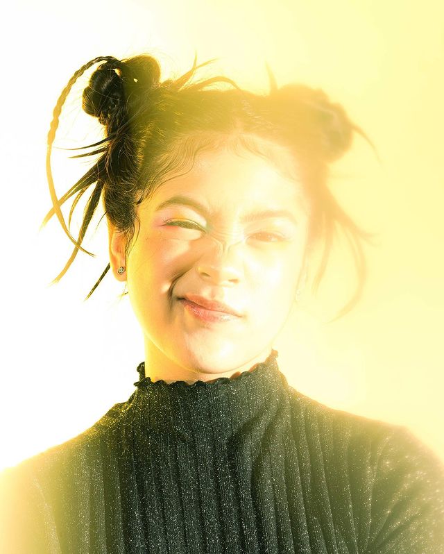 Niana Guerrero posing for the picture with making her hair in two sides ponytail