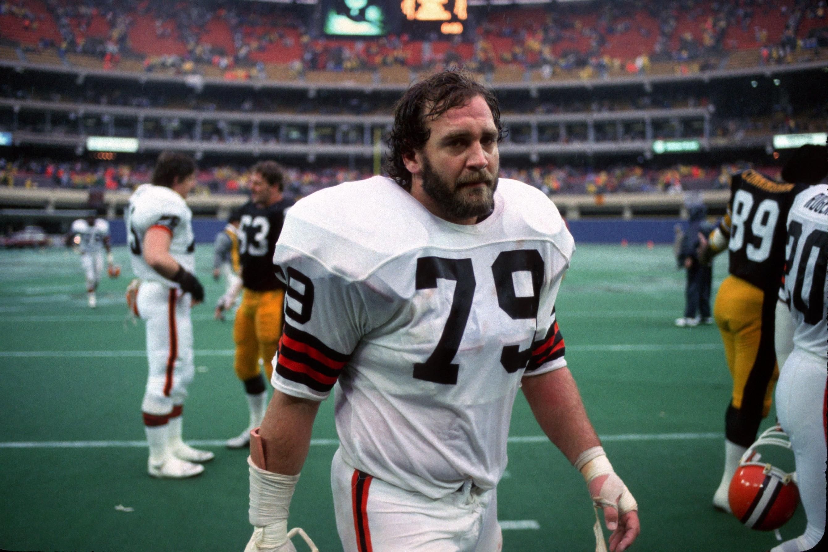Bob Golic wearing jersey in the stadium