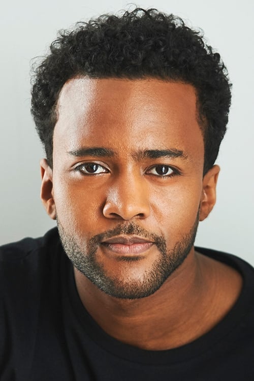 Dalmar Abuzeid posing for the photographs looking at the front side