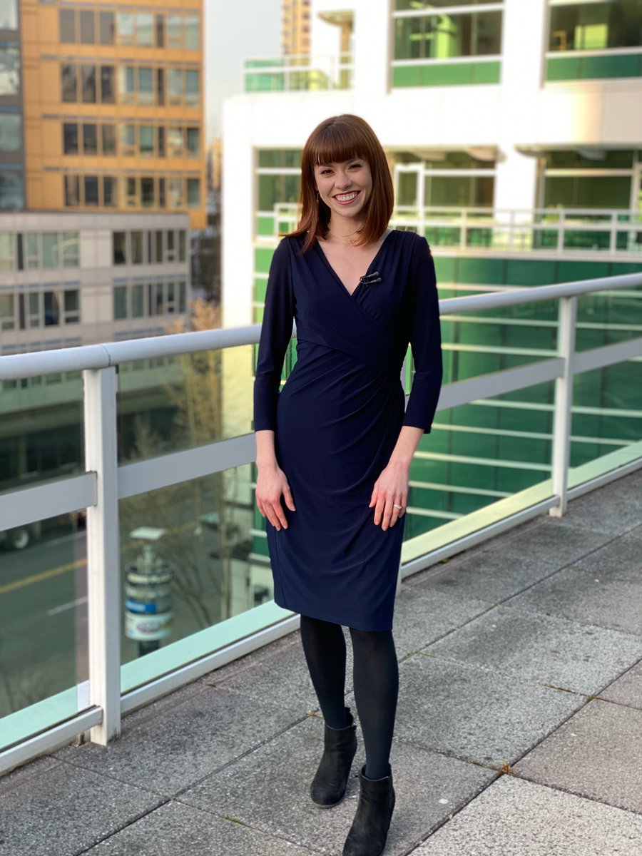 Abby Acone posing for a photoshoot.