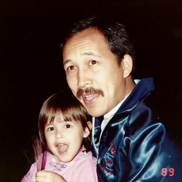 Childhood Picture of Kaylee Hartung with her father Joe Hartung posing for a photoshoot wearing pink color dress