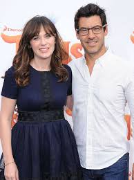 Elsie otter Pechenik's mother Zooey Deschanel and Jacob Pechenik in a frame