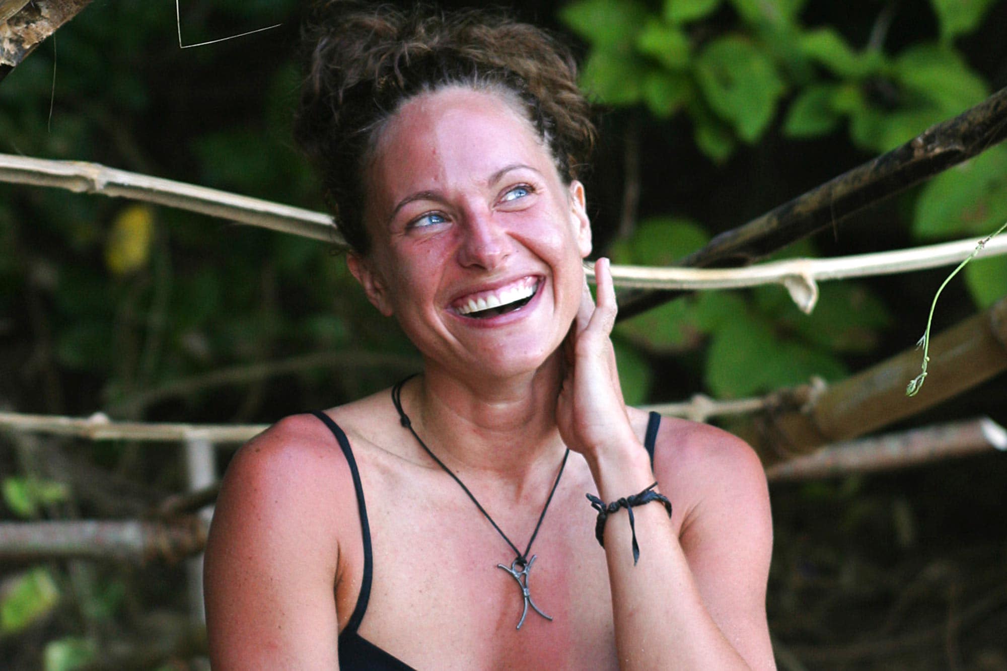 Jerri Manthey posing for the picture in a  smiley face.