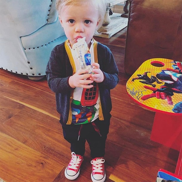 Remington Alexander Blackstock posing for the photo with eating