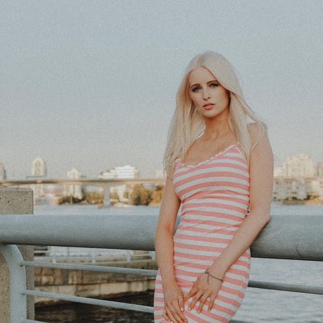  Photo of Michelle Molineux in wearing one piece and with a dark grey hair