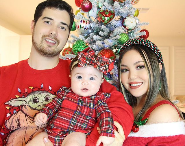 Picture of Anna Maria Perez de Tagle and her husband Scott Kline jr and her daughter, Amelia Grace.