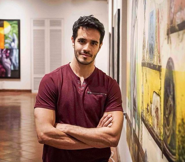 Picture of Ektor Rivera wearing red tshirt