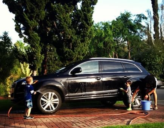 Screenshot of Nicole Zaloumis's car washing by her family 