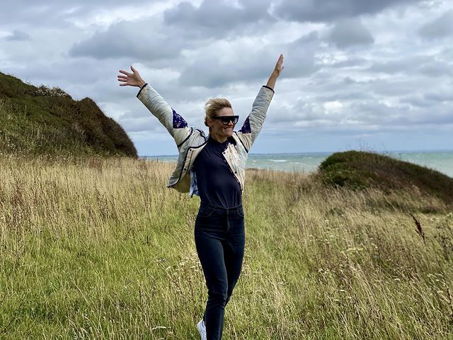 Picture of Liv Corfixen posing for a photoshoot wearing black jeans and t shirt 