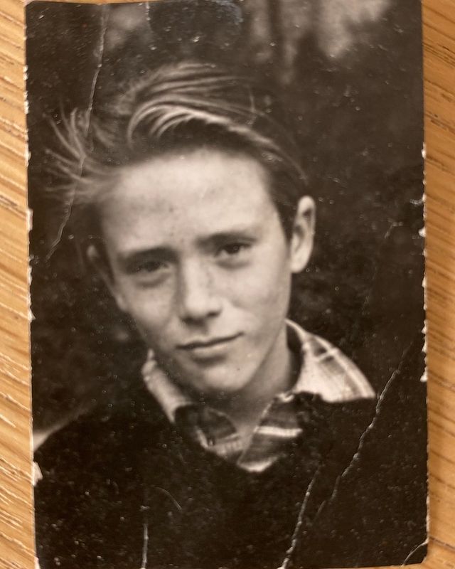 Childhood picture of Maria Erwolter's father wearing black color dress