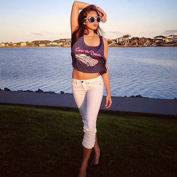 Picture of Natasha Gott posing for a photo near a lake.