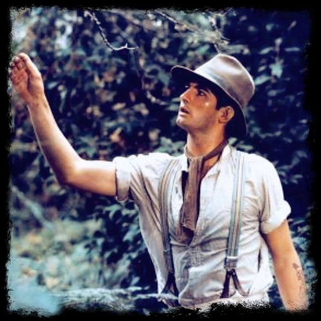 Picture of John Jarratt by wearing white shirt.