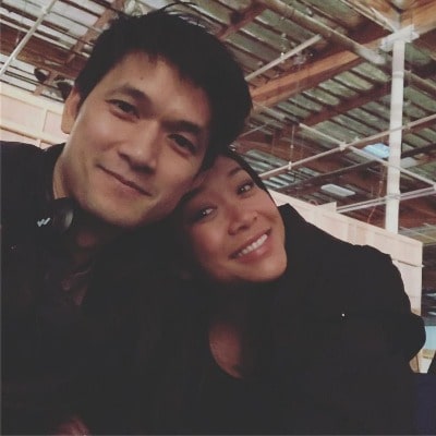 Shelby Rabara and her husband Harry Shum Jr cuddling