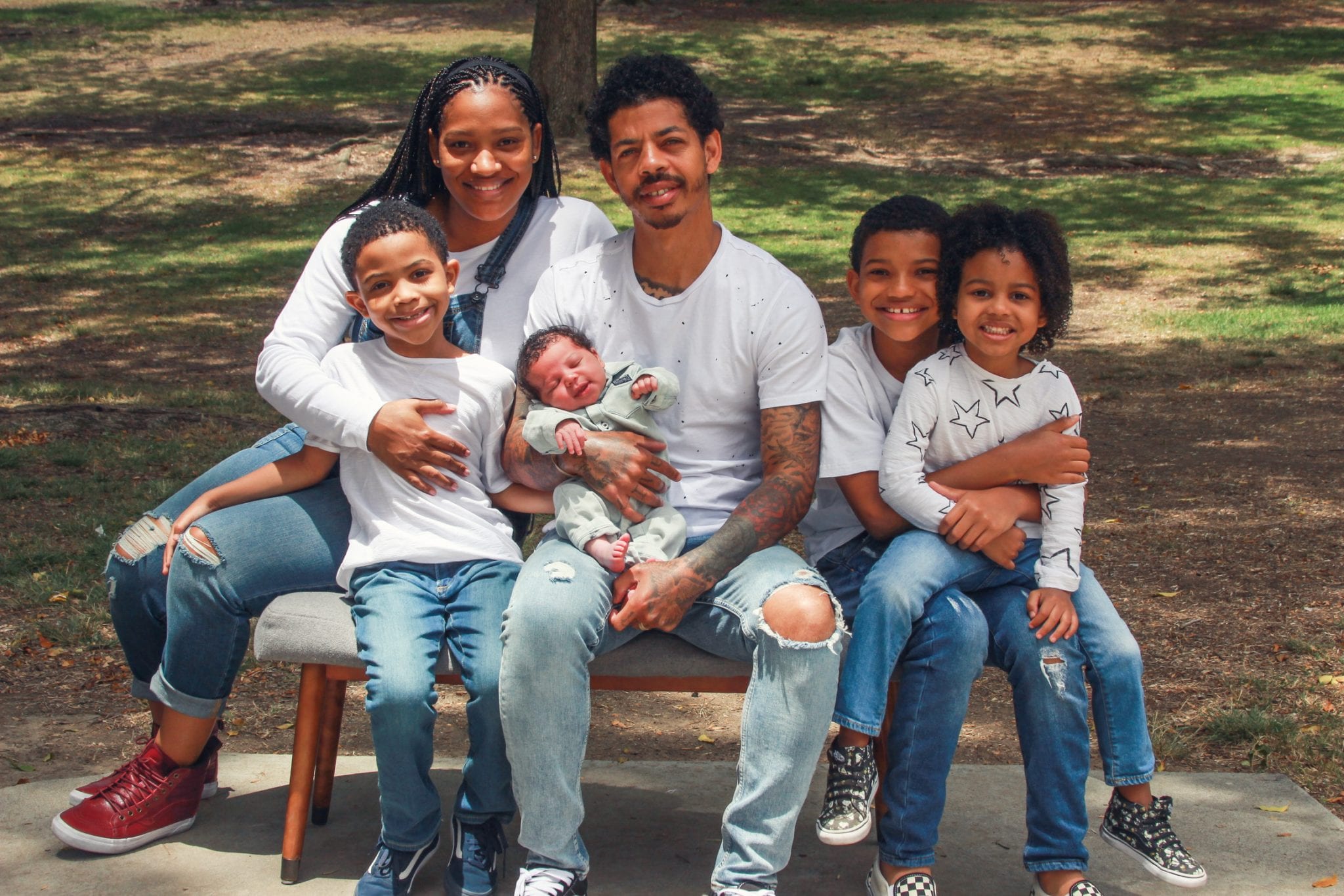 Photo of Lonnie Chavis along with his father, mother and three sibling brother.