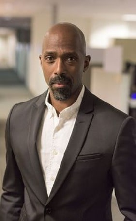 Ntare Guma Mbaho Mwine posing for a photo shoot.