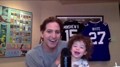 Peter Schrager with his son Mel Peter playing quiz while going live through his webcam