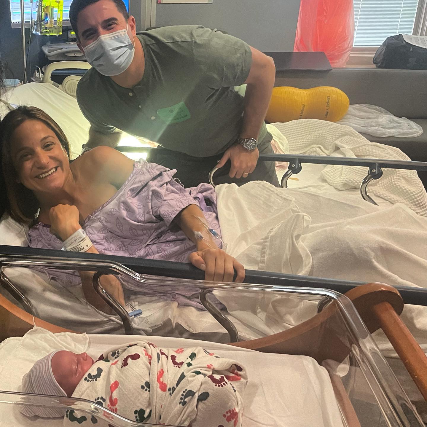 Picture of Dianna Russini, her husband Kevin Goldschmidt, and their beautiful child Michael Andrew 