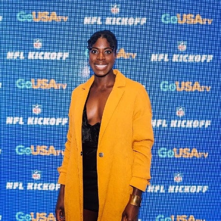 Christine Ohuruogu on GoUSA Tv  wearing yellow jacket