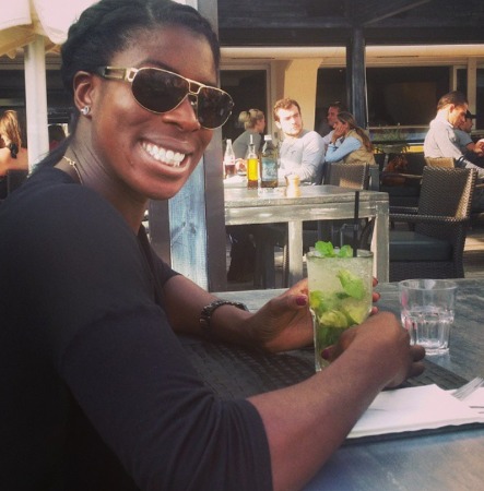 Christine Ohuruogu wearing black clothes and black glasses