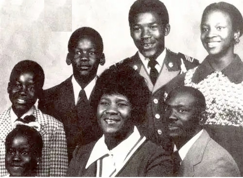 Black and white photo of Deloris Jordan with her husband James R. Jordan and children, Michael, James Jr., Larry, Deloris and Roslyn Jordan